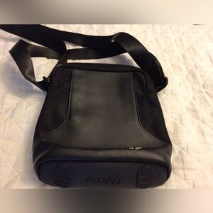 Crossbody tracker in black
